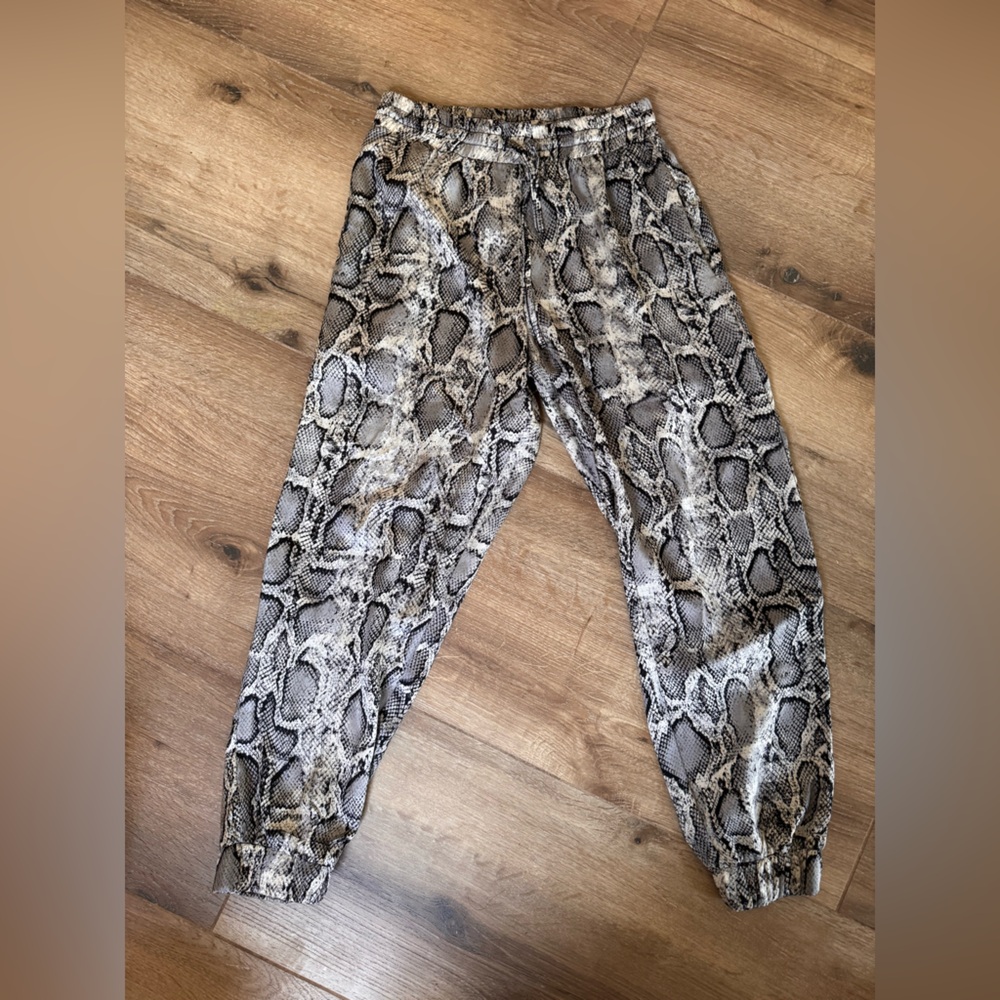 Silk snake print Bishop and Young jogger pants.